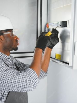 male-electrician-works-switchboard_255667-72859